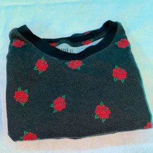 Black t-shirt with roses.
